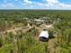 Extensive aerial perspective highlighting the property's layout and surrounding natural environment at 8146 Tropicaire Blvd, North Port, FL 34291