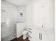 A modern bathroom featuring a glass enclosed shower, toilet, and vanity at 8146 Tropicaire Blvd, North Port, FL 34291