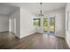 Bright dining room with access to the yard through patio doors at 8146 Tropicaire Blvd, North Port, FL 34291
