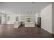Spacious kitchen with light countertops and dark wood-look floors at 8146 Tropicaire Blvd, North Port, FL 34291