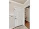 Clean entrance featuring a white door and neutral color scheme at 1030 Villagio Cir # 103, Sarasota, FL 34237