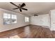 Bright and spacious living room with wood floors, offering a welcoming ambiance at 1030 Villagio Cir # 103, Sarasota, FL 34237