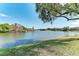 This picturesque pond features lush green landscaping and serene water views at 1030 Villagio Cir # 103, Sarasota, FL 34237