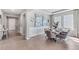 Dining room area with modern decor, stylish table set and tile flooring at 10721 Tippecanoe Pl, Parrish, FL 34219