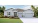 Charming single-story home with a well-manicured lawn and two-car garage at 10721 Tippecanoe Pl, Parrish, FL 34219