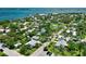 Aerial view showcasing the property in a waterfront community with pool at 12107 45Th W Ave, Cortez, FL 34215