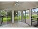 Sunroom with dining table set and sliding glass doors at 12107 45Th W Ave, Cortez, FL 34215