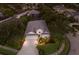 Aerial view of a well-maintained home with a lush landscaped yard at 1245 Millbrook Cir, Bradenton, FL 34212