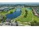 Beautiful aerial shot of a golf course community with water features and luxury apartments and homes at 1245 Millbrook Cir, Bradenton, FL 34212