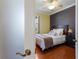 Bedroom with wood flooring, ceiling fan and a view of the outdoors at 1245 Millbrook Cir, Bradenton, FL 34212