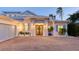 Charming single-story home with a well-manicured lawn and professionally landscaped yard at 1530 Pine Bay Dr, Sarasota, FL 34231
