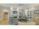 Cozy living room featuring modern furniture, a fireplace, and access to the outside at 1530 Pine Bay Dr, Sarasota, FL 34231