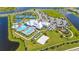 Aerial view of a community center featuring a pool, tennis courts, parking, and well-maintained landscaping at 15336 Serene Shores Loop, Bradenton, FL 34211