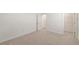 Bright, empty bedroom with neutral carpet, walk-in closet and a single window at 15336 Serene Shores Loop, Bradenton, FL 34211