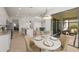 Open dining area with seamless flow into the kitchen and outdoor living space at 15336 Serene Shores Loop, Bradenton, FL 34211