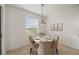 Charming dining nook illuminated by natural light, perfect for casual meals at 15336 Serene Shores Loop, Bradenton, FL 34211