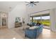 Comfortable living room showcasing beautiful backyard views and natural light at 15336 Serene Shores Loop, Bradenton, FL 34211