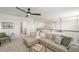 Bright living area with comfortable seating and an upstairs balcony at 15336 Serene Shores Loop, Bradenton, FL 34211