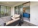 Screened patio showcases a seamless transition to the interior living spaces at 15336 Serene Shores Loop, Bradenton, FL 34211