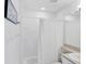 Bright bathroom with a shower and bathtub, complemented by a white shower curtain at 1613 Gondola Park Dr # 1613, Venice, FL 34292