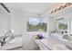Well-lit bathroom with double vanity and ample counter space at 1613 Gondola Park Dr # 1613, Venice, FL 34292