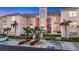 Attractive condo building featuring well maintained landscaping and accessible parking at 1613 Gondola Park Dr # 1613, Venice, FL 34292