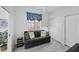 Stylish living room with a comfortable couch, a ceiling fan, and modern decor at 1613 Gondola Park Dr # 1613, Venice, FL 34292