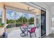 Relaxing screened patio with comfortable seating and scenic views at 1613 Gondola Park Dr # 1613, Venice, FL 34292