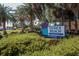 A colorful Venice Beach sign surrounded by lush greenery, inviting visitors to the scenic Sarasota County beach at 1613 Gondola Park Dr # 1613, Venice, FL 34292