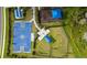 Overhead view of the community's recreational area, including a basketball court, playground, and covered seating areas at 16418 Slate Pl, Lakewood Ranch, FL 34211
