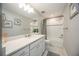 Modern bathroom with a neutral color scheme and a combination shower and tub at 16418 Slate Pl, Lakewood Ranch, FL 34211