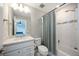 Clean bathroom with white cabinets and shower-tub combo at 16418 Slate Pl, Lakewood Ranch, FL 34211