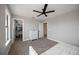 Bedroom featuring a walk-in closet and neutral walls at 16418 Slate Pl, Lakewood Ranch, FL 34211