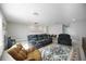 Bright living room with plush seating, decorative rug, and natural light at 16418 Slate Pl, Lakewood Ranch, FL 34211