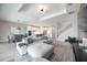 Bright, open-concept living space with modern furnishings and a stylish kitchen at 16418 Slate Pl, Lakewood Ranch, FL 34211