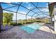 Enjoy this pool with a spa, screened enclosure, and outdoor lounge area, perfect for relaxation and entertaining at 16418 Slate Pl, Lakewood Ranch, FL 34211