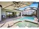 Enjoy this outdoor pool with a spa, patio, and lounge area, perfect for relaxation and entertaining guests at 16418 Slate Pl, Lakewood Ranch, FL 34211