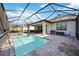 Enjoy this pool with a screened enclosure, patio, and a lounge area, creating a perfect backyard retreat at 16418 Slate Pl, Lakewood Ranch, FL 34211
