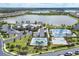Community amenities include a clubhouse, pool, tennis courts, and basketball court with a lake view at 17850 Polo Trl, Bradenton, FL 34211