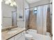 Well-lit bathroom with shower/tub, granite counter and vanity at 17850 Polo Trl, Bradenton, FL 34211