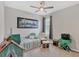 Nicely decorated bedroom with a ceiling fan, trundle bed, and furniture at 17850 Polo Trl, Bradenton, FL 34211