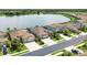 Beautiful single Gathering homes on a street facing a picturesque lake in a sunny community at 17850 Polo Trl, Bradenton, FL 34211