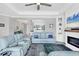 Spacious living room with open floor plan, stylish furniture, and abundant natural light at 17850 Polo Trl, Bradenton, FL 34211