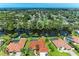 Stunning aerial view of a waterfront lot with canal access to the open bay at 2400 Lake Shore Dr, Nokomis, FL 34275
