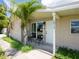 Front porch of a home featuring seating and a well-maintained exterior at 2416 Emory Ave, Bradenton, FL 34207
