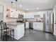 Modern kitchen with stainless steel appliances and granite countertops at 2416 Emory Ave, Bradenton, FL 34207