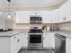 Kitchen featuring stainless steel appliances and sleek countertops at 2416 Emory Ave, Bradenton, FL 34207