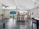 Open-concept living room featuring modern decor and an open layout to kitchen at 2416 Emory Ave, Bradenton, FL 34207