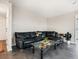 Well-lit living room with polished floors and modern furnishings at 2416 Emory Ave, Bradenton, FL 34207