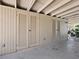 Covered outdoor area with storage doors at 2416 Emory Ave, Bradenton, FL 34207